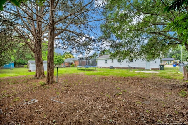 4709 Alamance Rd, Fayetteville, NC 28304 - view of yard featuring a trampoline