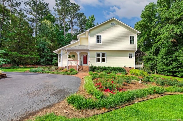1718 Carthage St, Sanford, NC 27330 - view of front of house with a porch and asphalt driveway