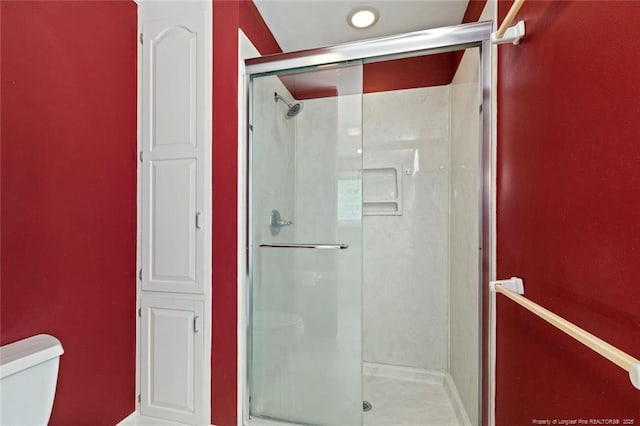1718 Carthage St, Sanford, NC 27330 - bathroom featuring toilet and a shower stall