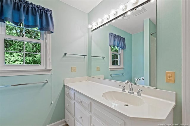 1718 Carthage St, Sanford, NC 27330 - full bathroom with vanity and baseboards