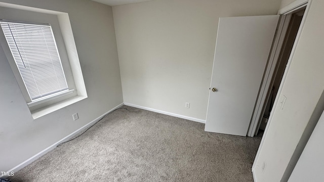 6005 Namozine Ct, Raleigh, NC 27610 - empty room featuring carpet and baseboards