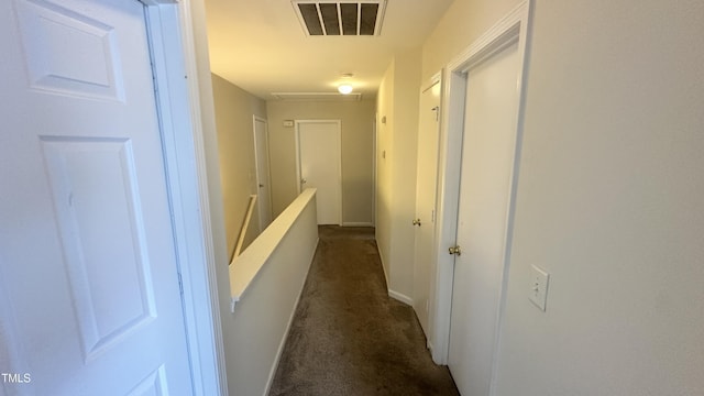 6005 Namozine Ct, Raleigh, NC 27610 - corridor with dark carpet and baseboards