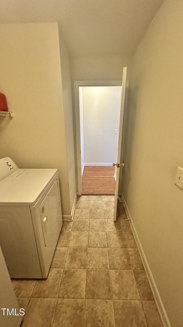 6005 Namozine Ct, Raleigh, NC 27610 - laundry room with washer / dryer and baseboards