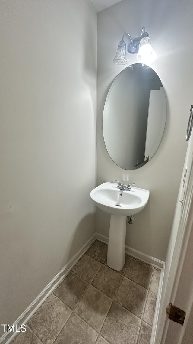 6005 Namozine Ct, Raleigh, NC 27610 - bathroom featuring baseboards