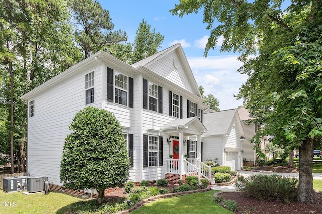 2422 Castleburg Dr, Apex, NC 27523 - view of front facade featuring a garage, driveway, and a front yard