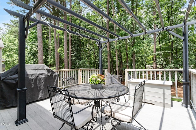 2422 Castleburg Dr, Apex, NC 27523 - wooden deck with a pergola, outdoor dining space, and grilling area