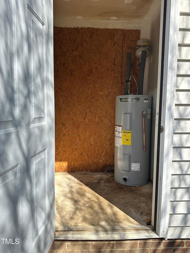 5100 Mass Rock Dr, Raleigh, NC 27610 - utility room featuring water heater