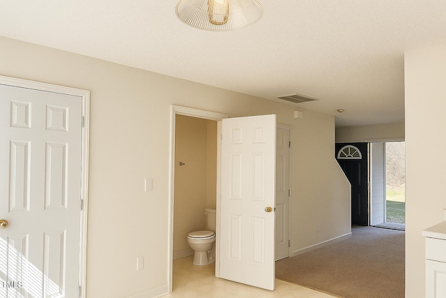 5100 Mass Rock Dr, Raleigh, NC 27610 - bathroom featuring toilet and baseboards