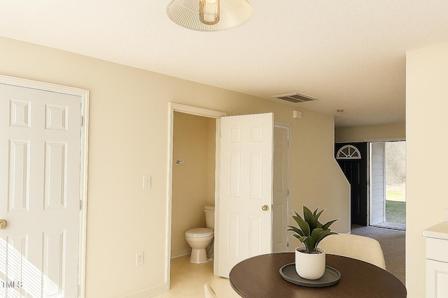 5100 Mass Rock Dr, Raleigh, NC 27610 - bathroom featuring toilet and baseboards