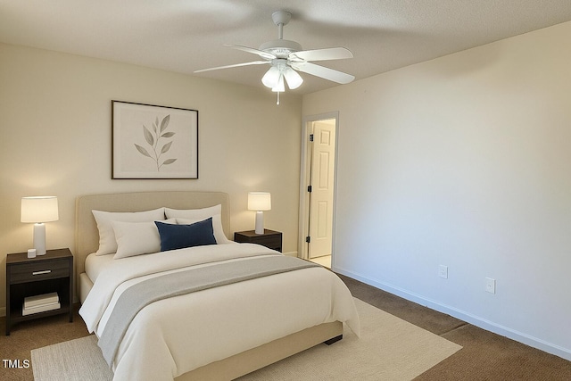5100 Mass Rock Dr, Raleigh, NC 27610 - bedroom with dark colored carpet and ceiling fan