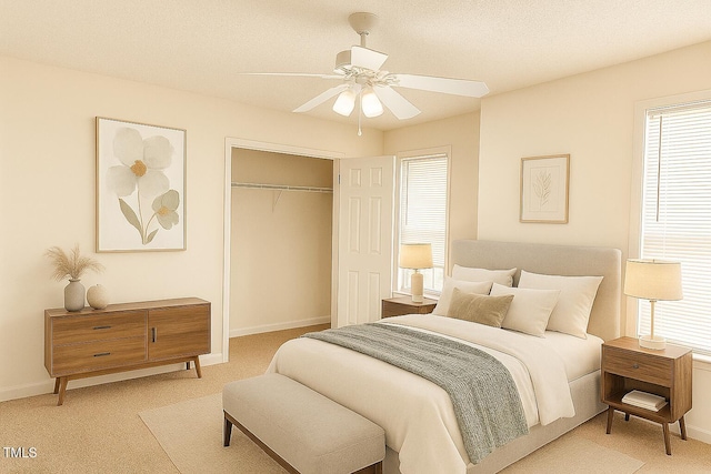 5100 Mass Rock Dr, Raleigh, NC 27610 - bedroom with a closet, light colored carpet, and ceiling fan