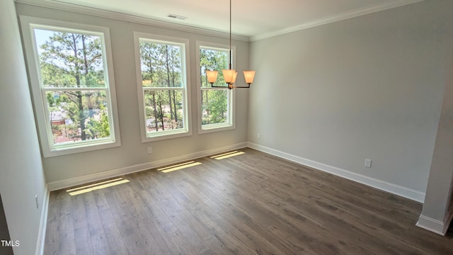 691 Bandon Aly, Cary, NC 27513 - unfurnished dining area with plenty of natural light, crown molding, baseboards, and dark wood-style flooring