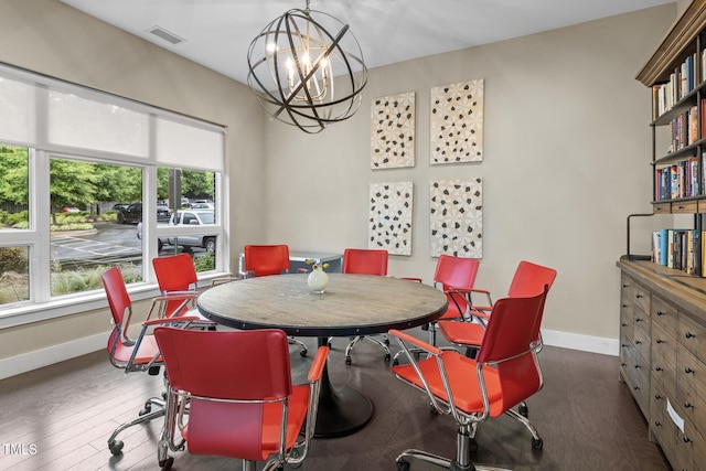 515 N Churton St Unit 203, Hillsborough, NC 27278 - dining area featuring baseboards, a chandelier, and wood finished floors