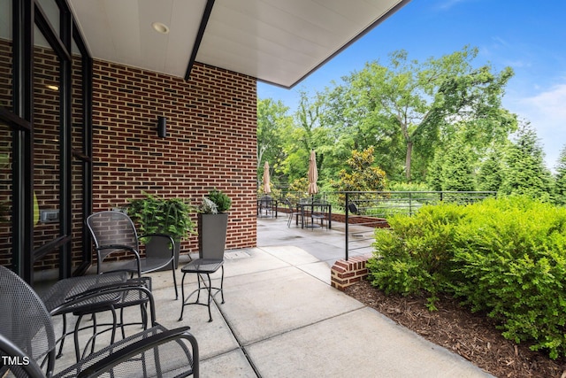 515 N Churton St Unit 203, Hillsborough, NC 27278 - view of patio with view of scattered trees