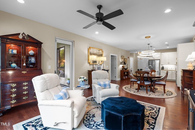515 N Churton St Unit 203, Hillsborough, NC 27278 - living area featuring wood finished floors, ceiling fan, a chandelier, and recessed lighting