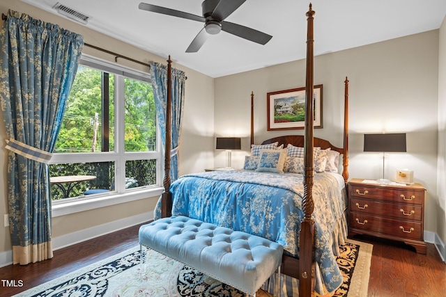 515 N Churton St Unit 203, Hillsborough, NC 27278 - bedroom featuring baseboards, dark wood-type flooring, and a ceiling fan