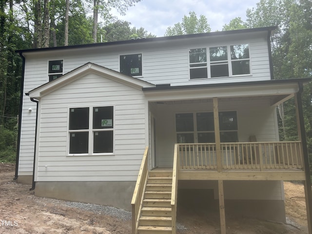 701 Locust Ln, Raleigh, NC 27603 - back of house with covered porch and stairs