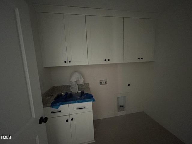 701 Locust Ln, Raleigh, NC 27603 - laundry room with cabinet space, hookup for an electric dryer, and washer hookup