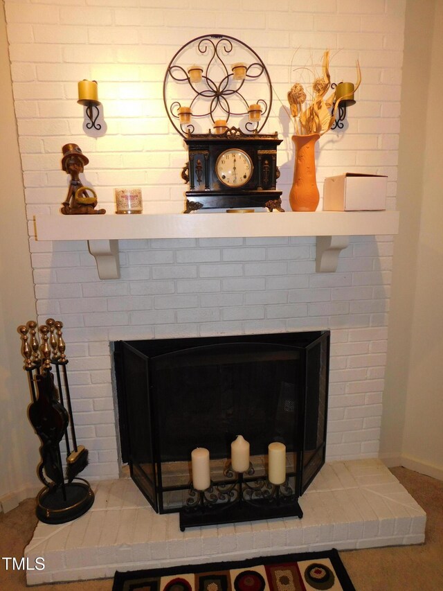5009 Tower Rd Unit B, Greensboro, NC 27410 - detailed view of a fireplace and baseboards