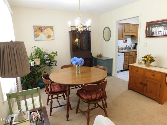 5009 Tower Rd Unit B, Greensboro, NC 27410 - dining room with a chandelier and light colored carpet