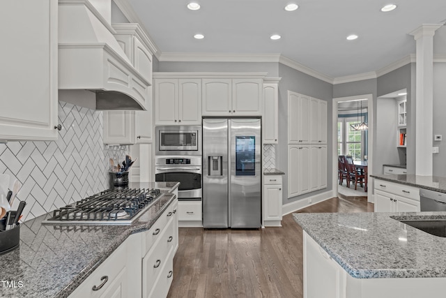 204 Franconia Way, Apex, NC 27502 - kitchen featuring appliances with stainless steel finishes, custom range hood, decorative backsplash, stone counters, and dark wood-type flooring