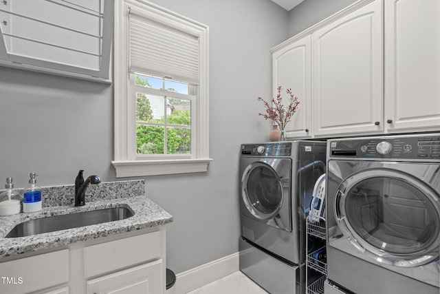 204 Franconia Way, Apex, NC 27502 - washroom featuring cabinet space, washing machine and dryer, and marble finish floors