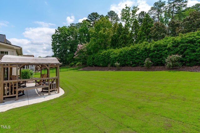 204 Franconia Way, Apex, NC 27502 - view of grassy yard with a patio area and a gazebo
