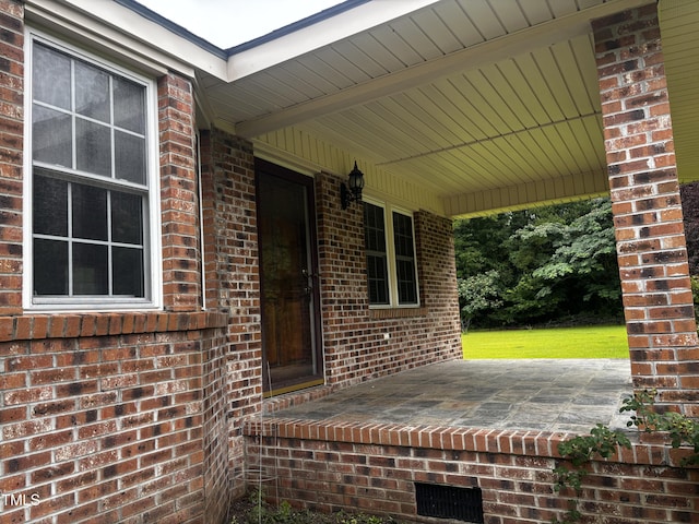 11477 NC-87, Elizabethtown, NC 28337 - covered porch featuring a lawn