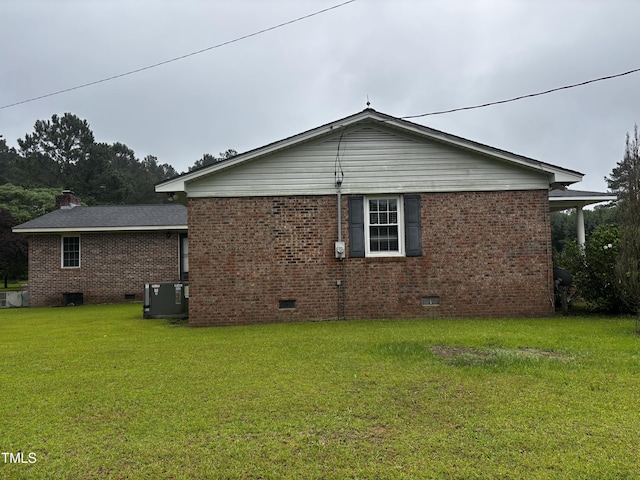 11477 NC-87, Elizabethtown, NC 28337 - view of side of property with crawl space, a lawn, and brick siding
