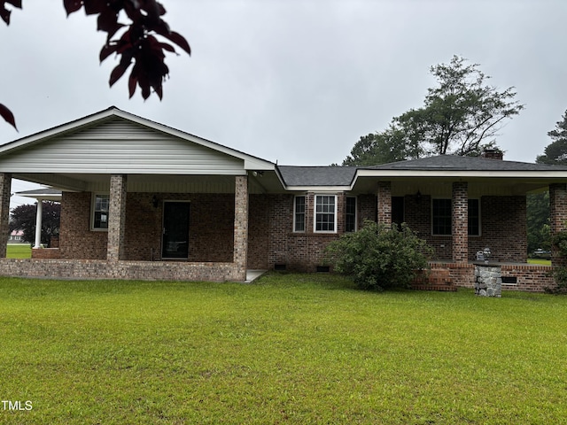 11477 NC-87, Elizabethtown, NC 28337 - single story home featuring crawl space, brick siding, a front lawn, and covered porch