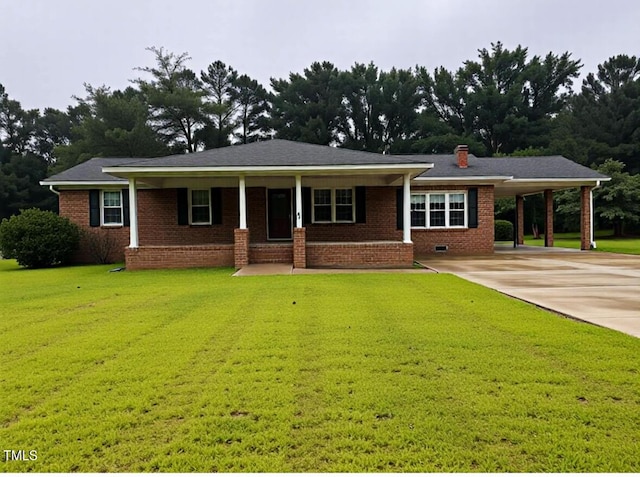 11477 NC-87, Elizabethtown, NC 28337 - view of front of property featuring an attached carport, brick siding, concrete driveway, and a front yard