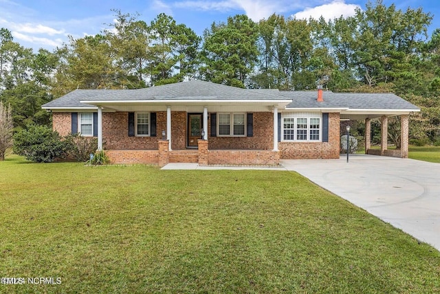 11477 NC-87, Elizabethtown, NC 28337 - single story home featuring covered porch, brick siding, a carport, and a front yard