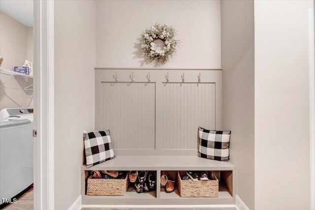 607 Laurel Lake Rd, Salemburg, NC 28385 - mudroom featuring washer / dryer, baseboards, and wood finished floors
