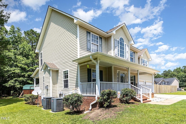 105 Rolling Stone Ct, Sanford, NC 27332 - view of front facade featuring a porch, cooling unit, and driveway