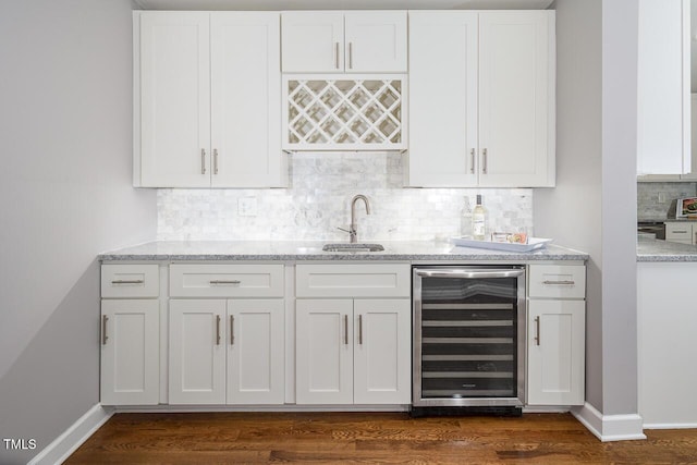 123 Becket Bnd, Pittsboro, NC 27312 - indoor wet bar with beverage cooler, tasteful backsplash, dark wood-type flooring, and baseboards
