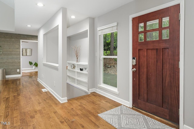 123 Becket Bnd, Pittsboro, NC 27312 - entrance foyer with wood finished floors, baseboards, and recessed lighting
