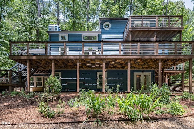 123 Becket Bnd, Pittsboro, NC 27312 - rear view of property featuring a wooden deck