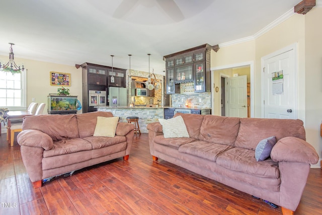 1770 Gentry Ridge Rd, Roxboro, NC 27574 - living room with dark wood-style flooring, ornamental molding, and a chandelier