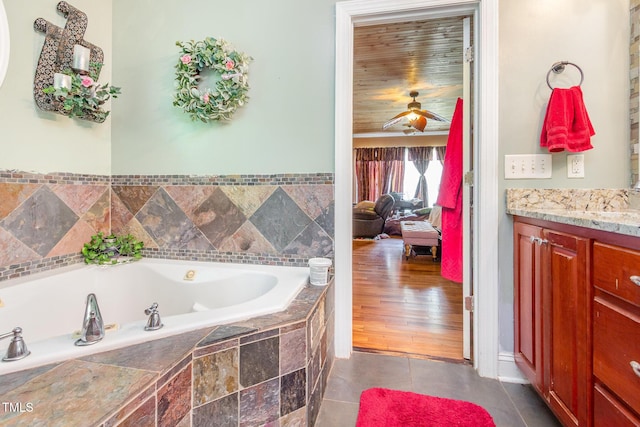 1770 Gentry Ridge Rd, Roxboro, NC 27574 - full bathroom with a garden tub, vanity, ceiling fan, and tile patterned floors
