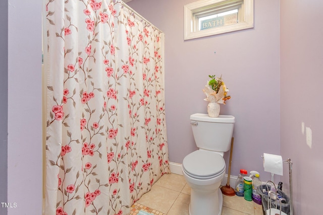 1770 Gentry Ridge Rd, Roxboro, NC 27574 - full bathroom featuring toilet, tile patterned floors, curtained shower, and baseboards