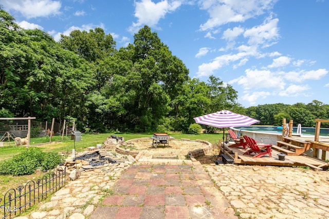 1770 Gentry Ridge Rd, Roxboro, NC 27574 - view of patio / terrace featuring an outdoor fire pit, a deck, and an outdoor pool