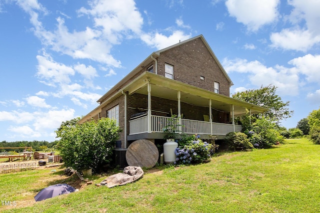 1770 Gentry Ridge Rd, Roxboro, NC 27574 - rear view of house with brick siding and a lawn