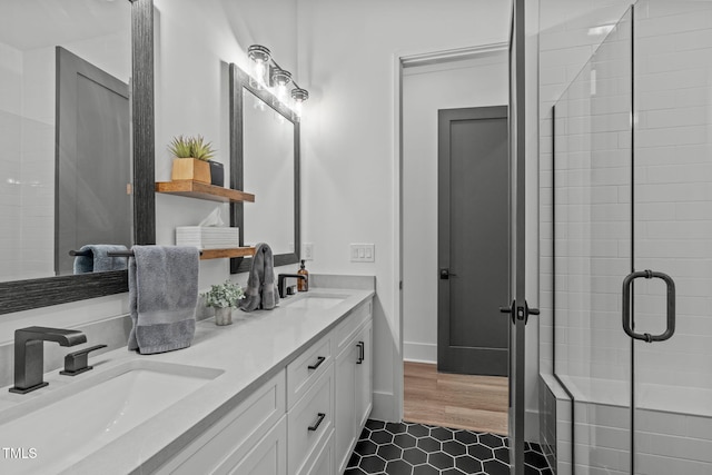 415 1st St, Apex, NC 27502 - full bath with double vanity, tile patterned flooring, and a shower stall