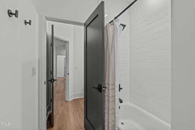 415 1st St, Apex, NC 27502 - full bathroom with wood finished floors and shower / bathtub combination with curtain