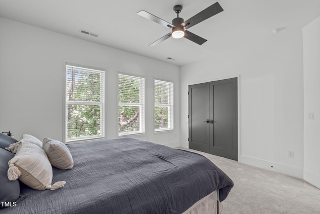 415 1st St, Apex, NC 27502 - carpeted bedroom featuring baseboards, a ceiling fan, and a closet