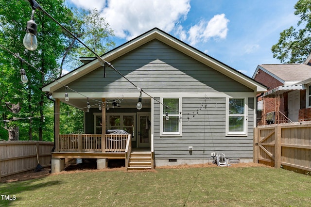 415 1st St, Apex, NC 27502 - rear view of house featuring crawl space and a wooden deck