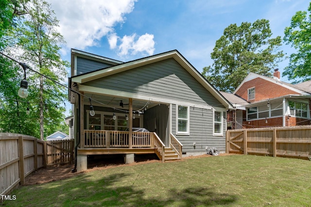 415 1st St, Apex, NC 27502 - rear view of house with a sunroom, a deck, and crawl space