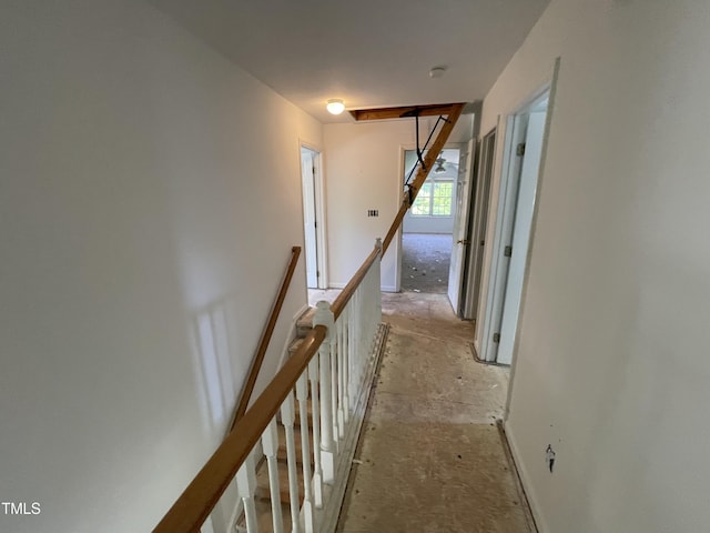 2208 Fieldmont Ct, Raleigh, NC 27614 - corridor featuring an upstairs landing, baseboards, and attic access