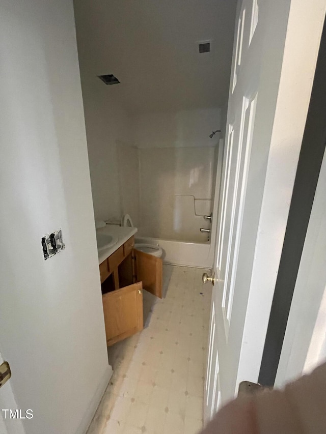 2208 Fieldmont Ct, Raleigh, NC 27614 - full bath with tile patterned floors, vanity, toilet, and washtub / shower combination