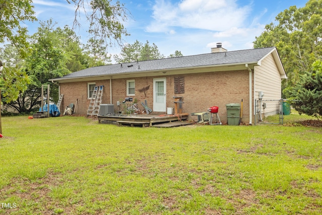 6424 Bretton Woods Dr, Hope Mills, NC 28348 - rear view of house featuring a deck, brick siding, a gate, central AC unit, and a chimney